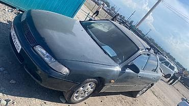 gak aion v: Mazda 626: 1995 г., 1.8 л, Механика, Бензин, Седан — 9