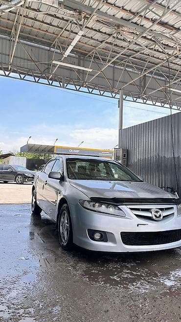 дефлектор: Mazda (праворульная) — салон и оснащение - Руль справа — 6