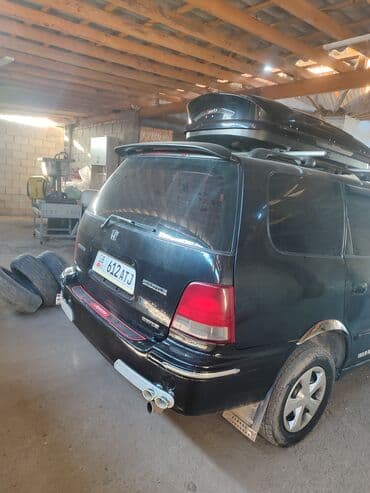 обмен авто с доплатой: Honda Odyssey: 1999 г., Автомат, Бензиновая, Минивэн — 22