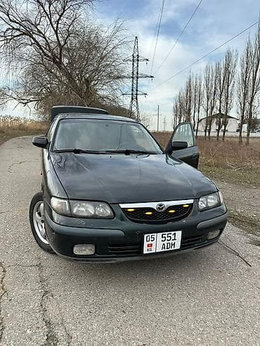 Mazda 626: 1999 г., 2 л, Ручные, Газ, Седан — 3