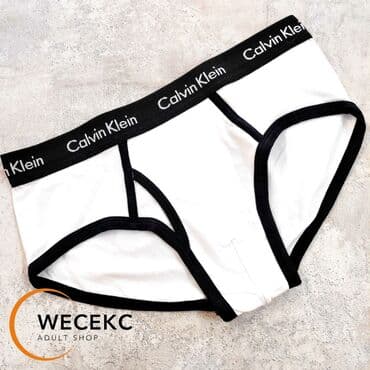 мерс трусы: Трусы Calvin Klein белого цвета с эластичным поясом, украшенным — 1