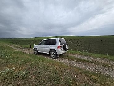 авто мабиль: Mitsubishi Pajero iO: 2000 г., 1.8 л, Автомат, Бензин, Внедорожник — 4