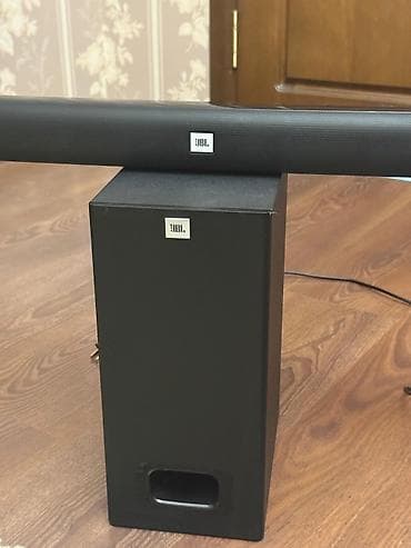 В идеальном состоянии Саундбар JBL с проводным сабвуфером - Формат — 3