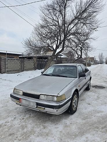 марх 2: Mazda 626: 1989 г., Механика, Бензин, Седан — 1