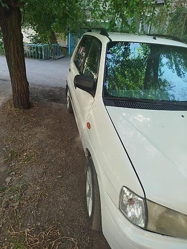 mazda 121: Mazda Demio: 2001 г., 1.3 л, Механика, Бензин, Универсал — 1