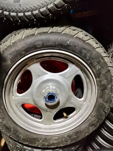 zimmer e9 pro: Колесо для скутера в сборе с шиной размером 3.00-10. Имеет серый литой — 1