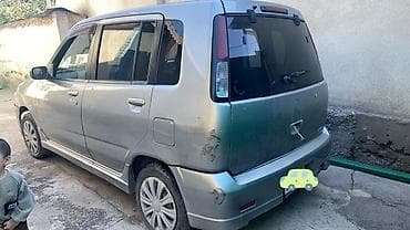 соко мтз: Nissan Cube: 1999 г. — 4