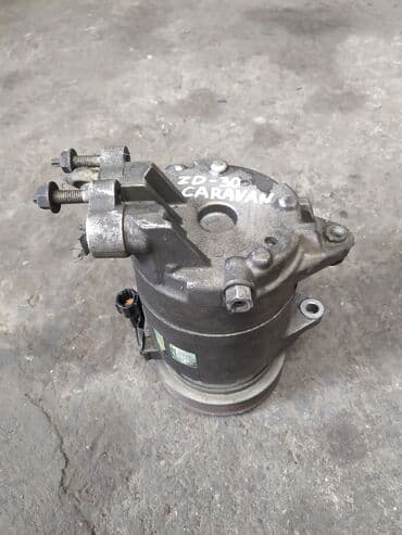 кабина сампо: Nissan Caravan компрессор кондиционера, Ниссан Караван компресор — 1