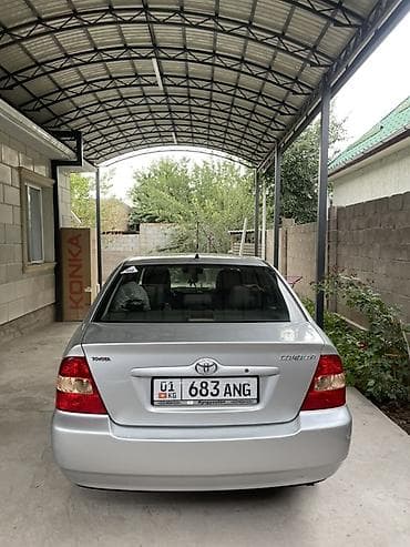 Унаа: Toyota Corolla: 2003 г., 1.4 л, Кол менен иштөөчү, Бензин, Седан — 3