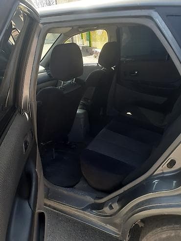 mazda 929: Mazda 323: 2003 г., 1.6 л, Механика, Бензин, Универсал — 5