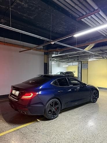 Продажа авто: Редкая модификация Genesis G70, темно-синий седан бизнес‑класса с — 1