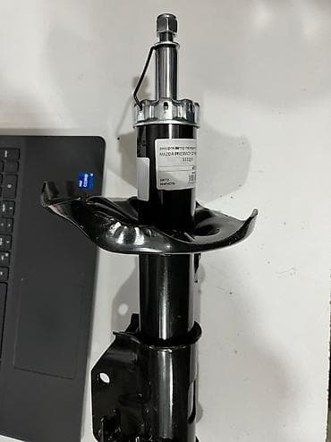 mazda: Передний амортизатор Mazda 2005 г., Новый — 2