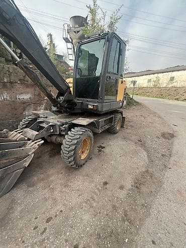 вольво робот тягач: Экскаватор, Volvo, Колесный — 1
