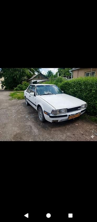 Mazda 626: 1984 г., Механика, Седан — 4
