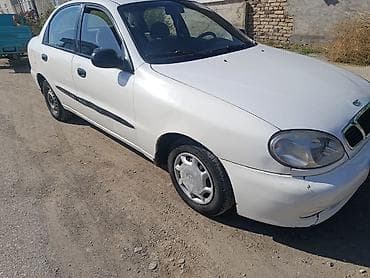 лабо 2004: Daewoo Lanos: 1999 г., 1.5 л, Механика, Бензин, Седан — 1