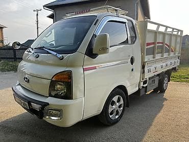 грузовики легкие: Hyundai Porter II грузовой бортовой - Компактный городской грузовик с — 2