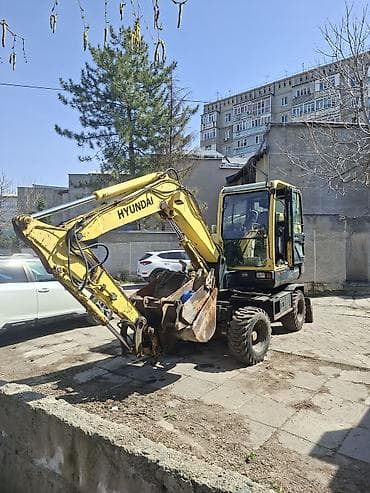 екскаватор 55: Экскаватор, Hyundai, 2010 г., Колесный — 1