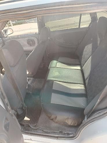 аукцион киргизских номеров: Daewoo Nexia: 1998 г., 1.5 л, Седан — 5
