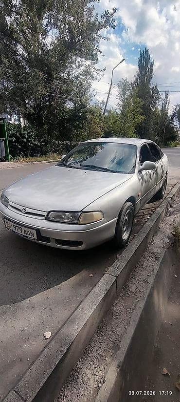 купить дверные ручки: Mazda 626: 1994 г., 2 л, Автомат, Бензин, Седан — 4
