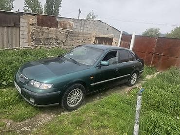 Mazda 626: 2000 г., 0.2 - engine capacity л, Кол менен иштөөчү, Бензин, Хетчбек — 1