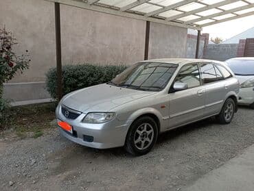 Mazda 323: 2002 г., 1.6 л, Автомат, Бензин, Хэтчбэк