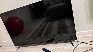 Телевизор Redmi (Smart TV) - Диагональ около 50–55" (тонкие рамки