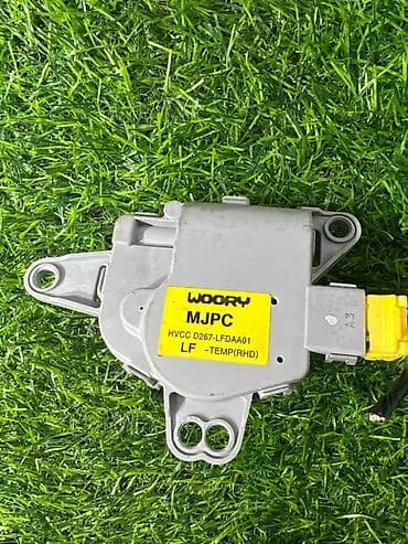 Сервопривод заслонки печки (привод регулировки температуры, левый