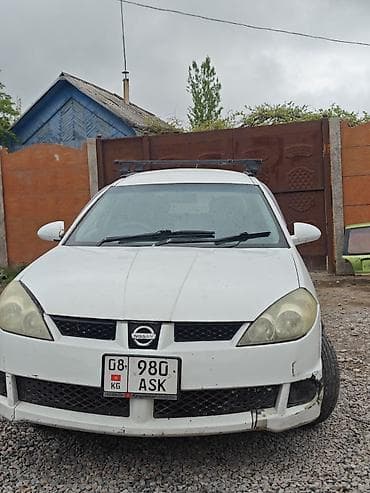 ключ ниссан: Nissan Wingroad: 2003 г., 1.5 л, Автомат, Бензин, Универсал — 3
