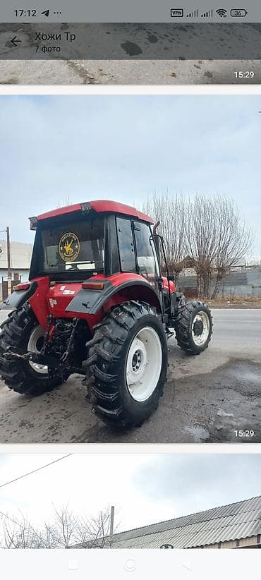 Трактор колесный с кабиной, передним и задним навесным устройством и