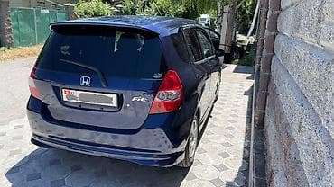 e 302: Honda Fit: 2003 г., 1.3 л, Вариатор, Бензин, Хэтчбэк — 2