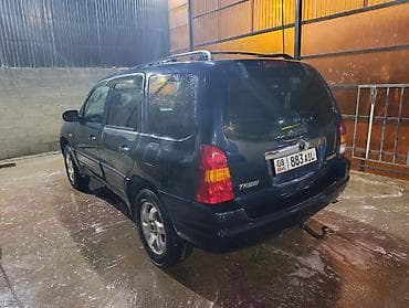аудио касета: Mazda Tribute: 2003 г., 2 л, Механика, Газ, Кроссовер — 4