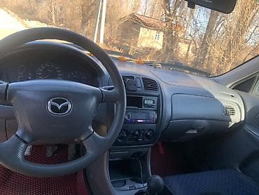 мазда xsedos: Mazda Familia: 2001 г., Механика, Бензин, Универсал — 9