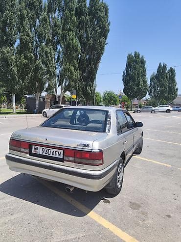 без дтп: Mazda 626: 1990 г., 2 л, Механика, Бензин, Седан — 3