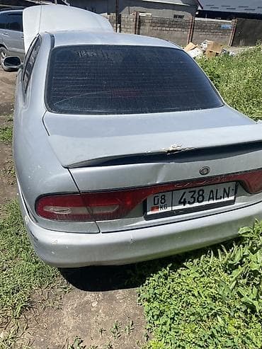 Продажа авто: Mazda 323: 1999 г., Механика, Бензин, Седан — 6