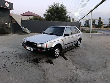 уаз hunter: Mazda 323: 1985 г., 1.5 л, Механика, Бензин, Хэтчбэк — 1