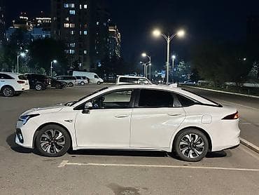 GAC: GAC Aion S, белый седан на электротяге Ключевые особенности: - — 2
