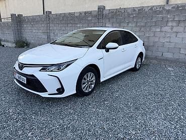 Toyota Corolla: 2021 г., 1.8 л, Вариатор, Гибрид, Седан — 2