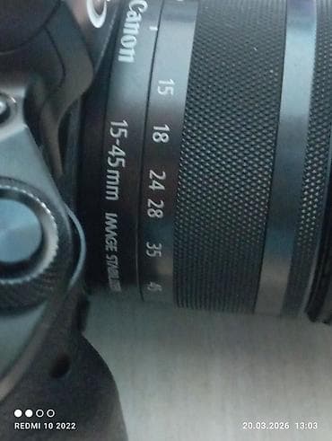 Видеокамеры: Беззеркальная камера Canon EOS M-серии с кит-объективом Canon Zoom — 6