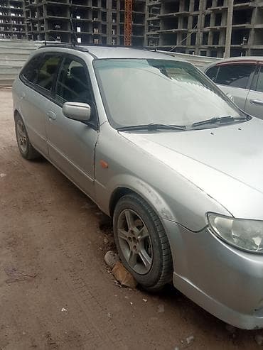 mini car: Mazda Familia: 2003 г., Универсал — 2