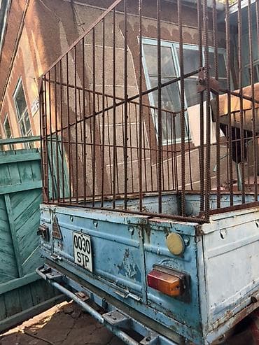 Прицеп-грузоподъёмности с высокими решётчатыми надставными бортами at lalafo.kg Прицеп-грузоподъёмности с высокими решётчатыми надставными бортами