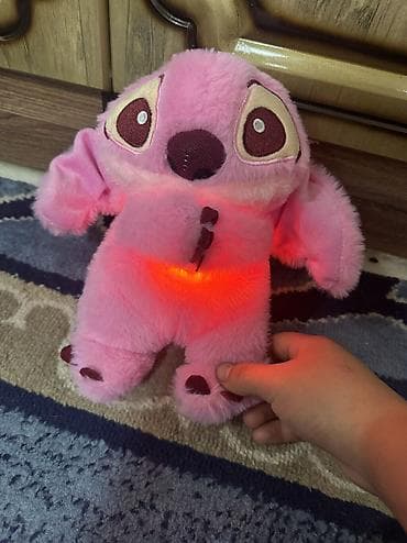 Продаю игрушку с песней и сердце биение новый