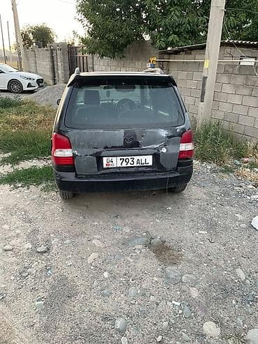 Mazda Demio: 2000 г. — 5