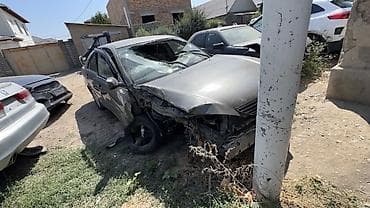 естима 2005: Toyota Camry XV30, комплектация LE, седан, цвет тёмно‑серый — 4
