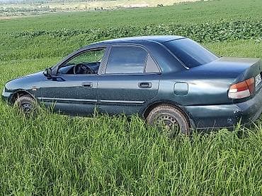 домкрат мазда: Mazda 323: 1999 г., Механика, Бензин, Седан — 4