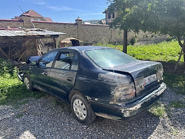 бампер на калдину: Toyota Carina E: 1992 г., 1.6 л, Механика, Бензин, Седан — 4