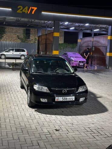 полик нексия 2: Mazda 323: 2001 г., 1.6 л, Механика, Бензиновая, Седан — 4