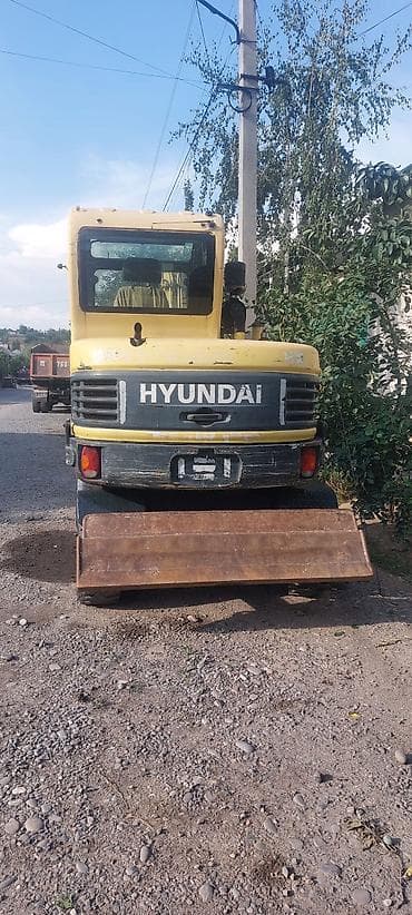 каракол мото: Экскаватор, Hyundai, Колесный — 3