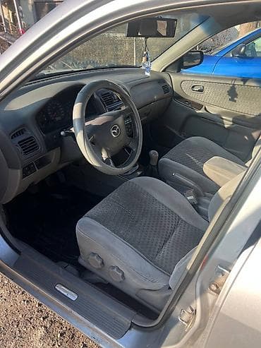mazda 5: Mazda Capella: 2000 г., 1.8 л, Механика, Бензин, Хэтчбэк — 7
