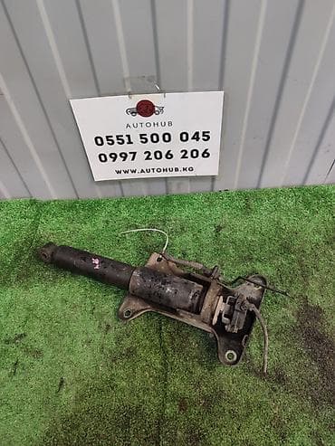 4m40: Передний амортизатор Mitsubishi 2003 г., Оригинал — 1