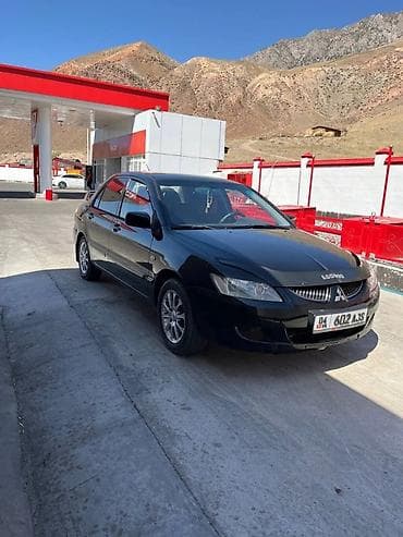 продаю мицубиси: Mitsubishi Lancer: 2005 г., 1.6 л, Механика, Бензин, Седан — 4